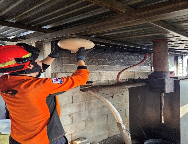 장수소방서, 화목보일러 주택 ‘자동확산소화기’ 무상 보급